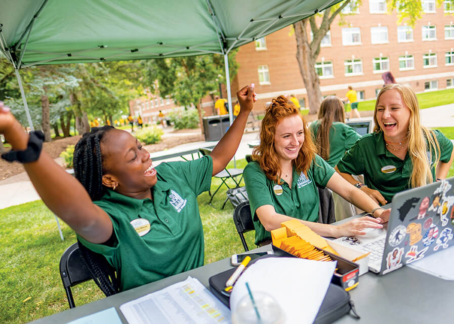 Student tour guides in a line