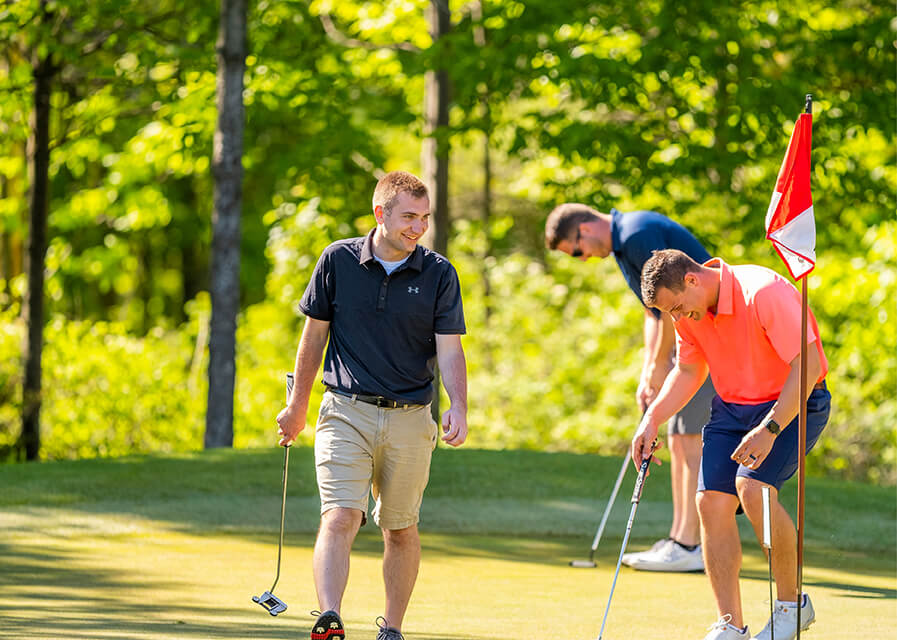 Golfers enjoying an outdoor activity